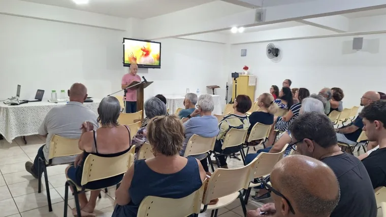 Palestra pública na casa
